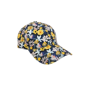 Navy floral digital print baseball cap with yellow and pink patterns from a side angle