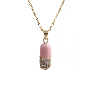 Pink gold pill pendant necklace with shimmering cubic zirconia and enamel on white base