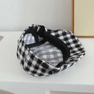 Classic black and white checkered newsboy cap for kids with adjustable metal buckle