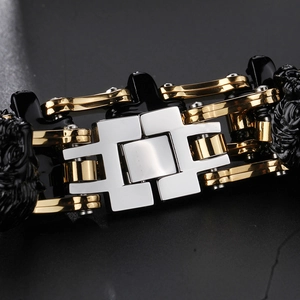 Macro shot of mechanical bike chain bracelet showing gold and silver steel links