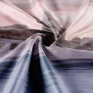 Macro shot of bohemian tapestry fabric showing premium silk-like texture and landscape print