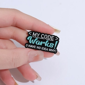 Funny enamel pin featuring My Code Works I Have No Idea Why quote on black background