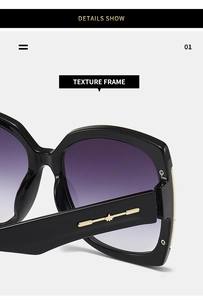 Detail show of texture frame with purple gradient lenses and gold metal accents