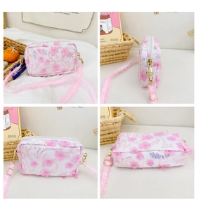 Detailed views of floral girls' crossbody bag with lace flower appliques and gold zipper