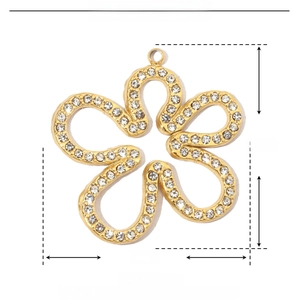 Detailed technical drawing of a 26mm gold flower pendant with inlaid rhinestones