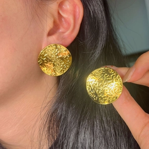 French vintage hammered gold round stainless steel earrings shown on model