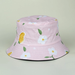 Pink floral bucket hat with white daisies and mango prints for outdoor sun protection