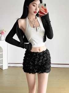 Three-piece set with white halter top, black cardigan and 3D floral mini skirt