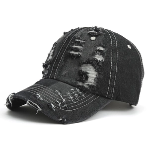 Distressed black denim baseball cap with vintage frayed holes and white contrast stitching