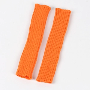Detail view of bright orange ribbed knit arm warmers with high elasticity and soft texture