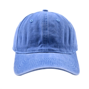Front view of a blue washed denim baseball cap with vintage finish on white background