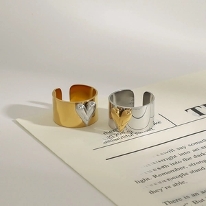 Two-tone minimalist heart rings in gold and silver finish with wide open adjustable bands