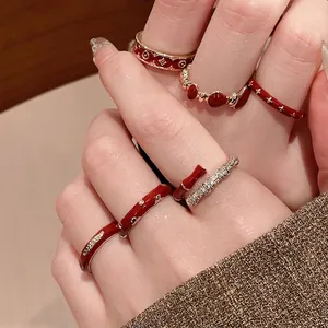 5-piece vintage 14k gold plated ring set with red enamel and star clover designs