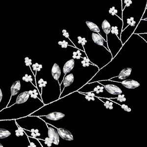 Handmade bridal headband featuring pearl flower clusters and marquise rhinestones on silver wire