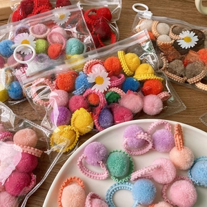 20pcs Macaron plush ball hair ties set in a transparent daisy branded storage bag