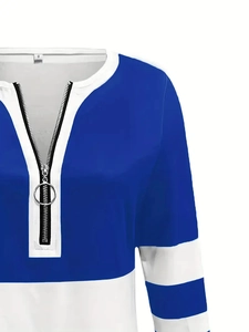 Detail of silver ring zipper on V-neck color-block striped sweatshirt in blue and white