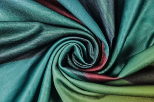 Detail of high-quality gradient fabric showing silky texture and fine twill weave