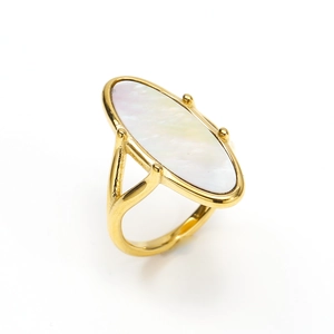 Macro shot of 18K gold plated ring with a natural oval mother of pearl shell inlay