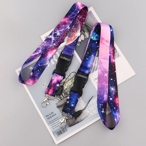 Detail of starry night universe printed polyester lanyard with plastic buckle and metal hook