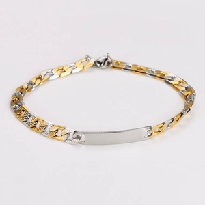 Detail view of 7mm two-tone gold and silver Cuban chain bracelet with smooth blank ID tag