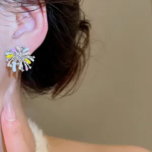 Elegant silver flower stud earrings with colorful enamel and sparkling crystals