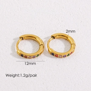 Detail shot of golden huggie earrings featuring multicolored cubic zirconia stones and sizing