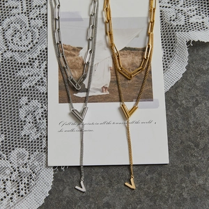 Elegant 18K gold plated titanium V-pendant double layer necklace with tassel chain