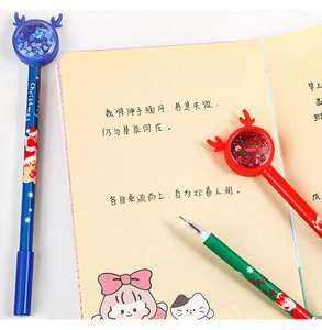 Close-up of Christmas gel pen featuring reindeer antlers and floating sequins design