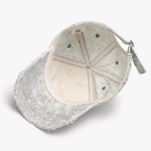 Light grey washed distressed baseball cap with ripped details and adjustable back strap