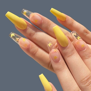 Long coffin fake nails featuring bright yellow finish and glitter butterfly sequins
