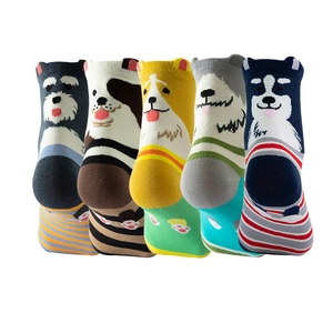 Five pairs of cotton crew socks featuring cute cartoon dog patterns in diverse colors