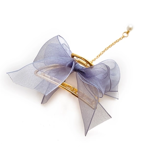 Elegant gold metal hair claw with blue mesh bow and pearl tassel pendant accessory