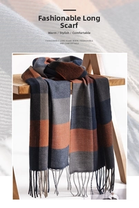 Detail of checkered cashmere-feel scarf with fringes on a rustic chair