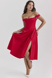 Detail of red satin floral dress showing the slim fit waist and high side slit design