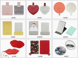 Collection of portable slim stainless steel mirrors with various faux leather PU cases