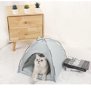 Detail view of the breathable grey pet tent bed with a soft cushion for cats and dogs
