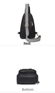 Detail view showing back and bottom of black lychee grain PU leather sling bag with woven strap