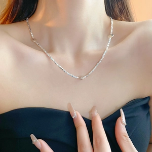 Chic silver smile pendant necklace for women with minimalist metallic beaded chain design