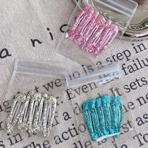 Set of colorful sequin teardrop BB hair clips in pink, silver and blue glitter finishes