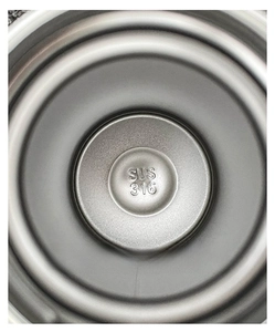 Macro shot of SUS 316 stainless steel interior bottom with engraved material mark