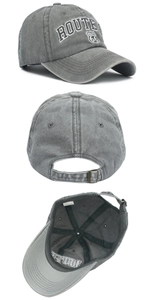 Detail view of washed cotton Route 66 baseball cap with adjustable metal buckle and embroidery