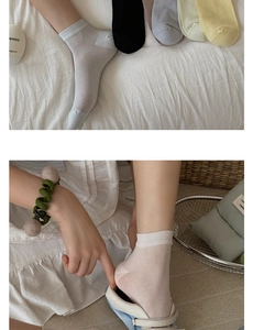 Detail of breathable silk ankle socks in multiple pastel colors with ribbed cuffs