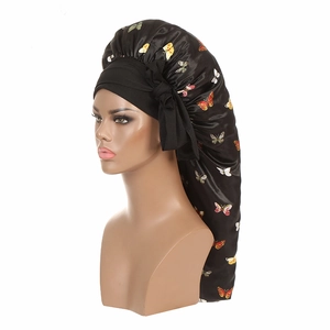 Long satin bonnet for hair protection featuring colorful butterfly prints on black fabric