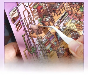Close-up of placing coffee and bar stickers into a DIY miniature scene with tweezers