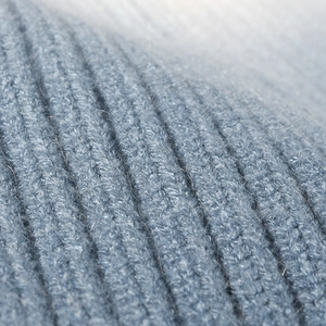 Thick ribbed knit beanie in soft blue core-spun yarn with a warm textured dome finish