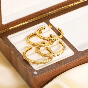18K gold C-shaped hoop earrings with colorful zircon stones in a luxury gift box
