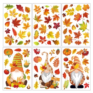 Detail view of six sheets featuring maple leaves, pumpkins, and gnomes window stickers