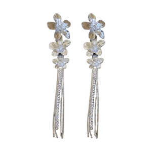Elegant silver metal flower drop earrings with long tassel chains and sparkling rhinestones