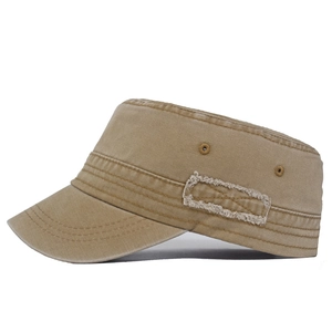 Macro view of khaki washed cotton cadet cap with side patch and metal eyelets
