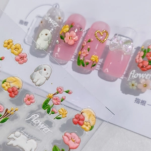 5D embossed nail stickers featuring 3D white rabbits and pink flowers on pink nails